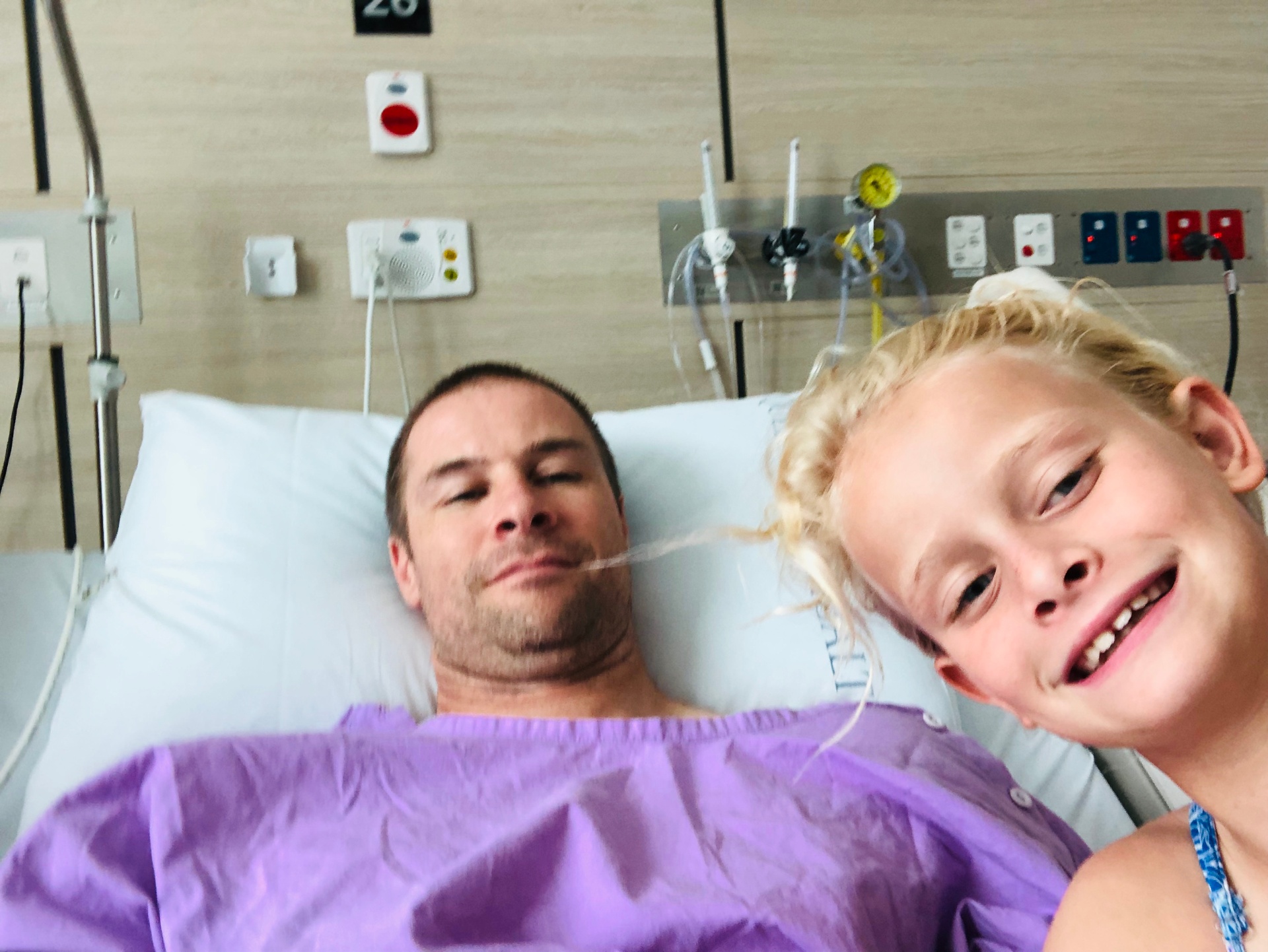 Chris with his daughter during a hospital stay